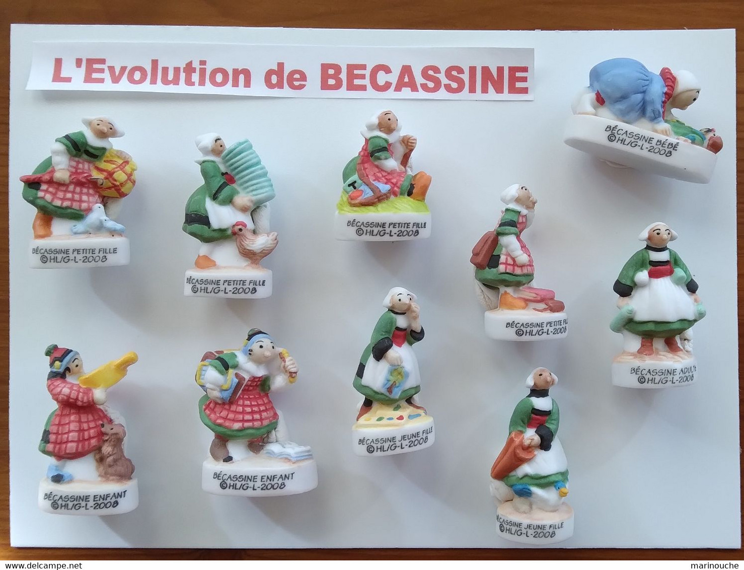 L'EVOLUTION DE BECASSINE - Série Complète De 10 Fèves Mates - 2008 - - Characters