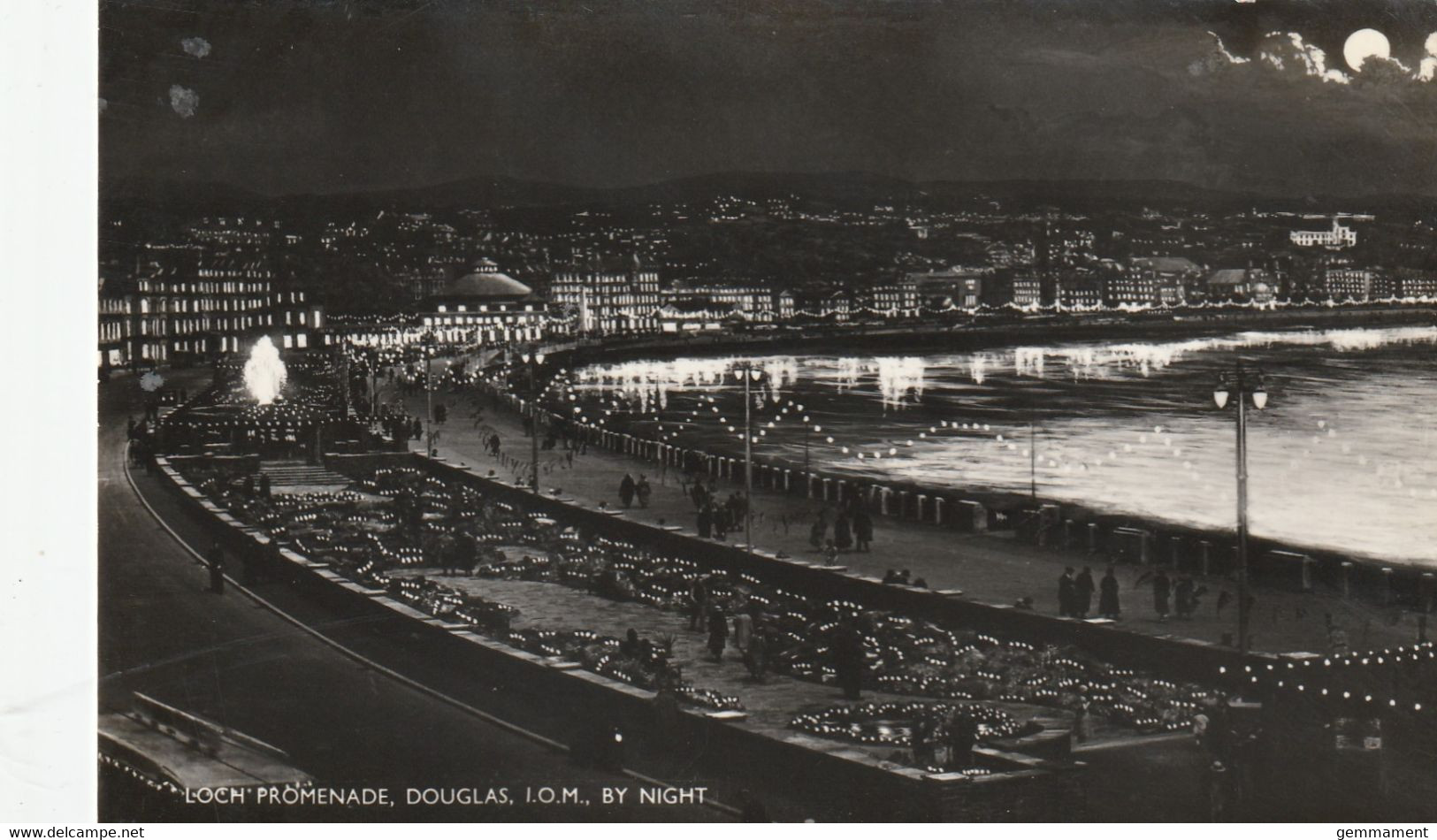 DOUGLAS -LOCH PROMENADE BY NIGHT.  MGP RACES SLOGAN - Isle Of Man