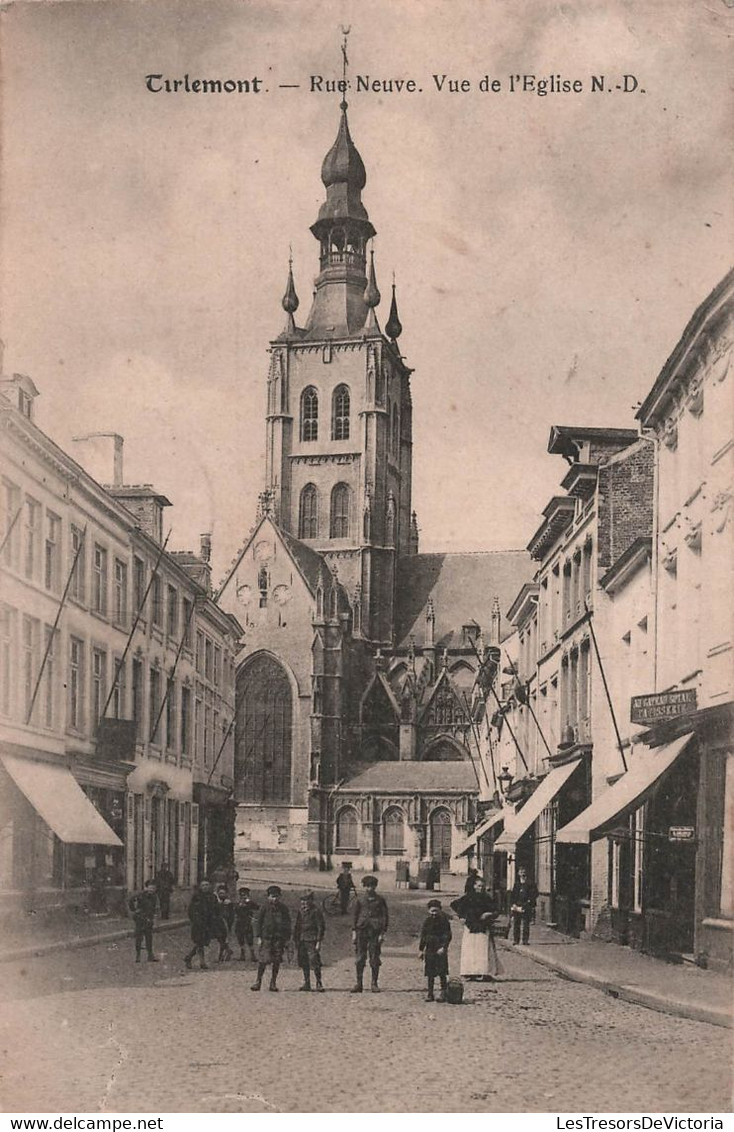 BELGIQUE - Tirlemont - Rue Neuve - Vue De L'eglise N D - Animé - Timbre Taxe - Carte Postale Ancienne - - Tienen