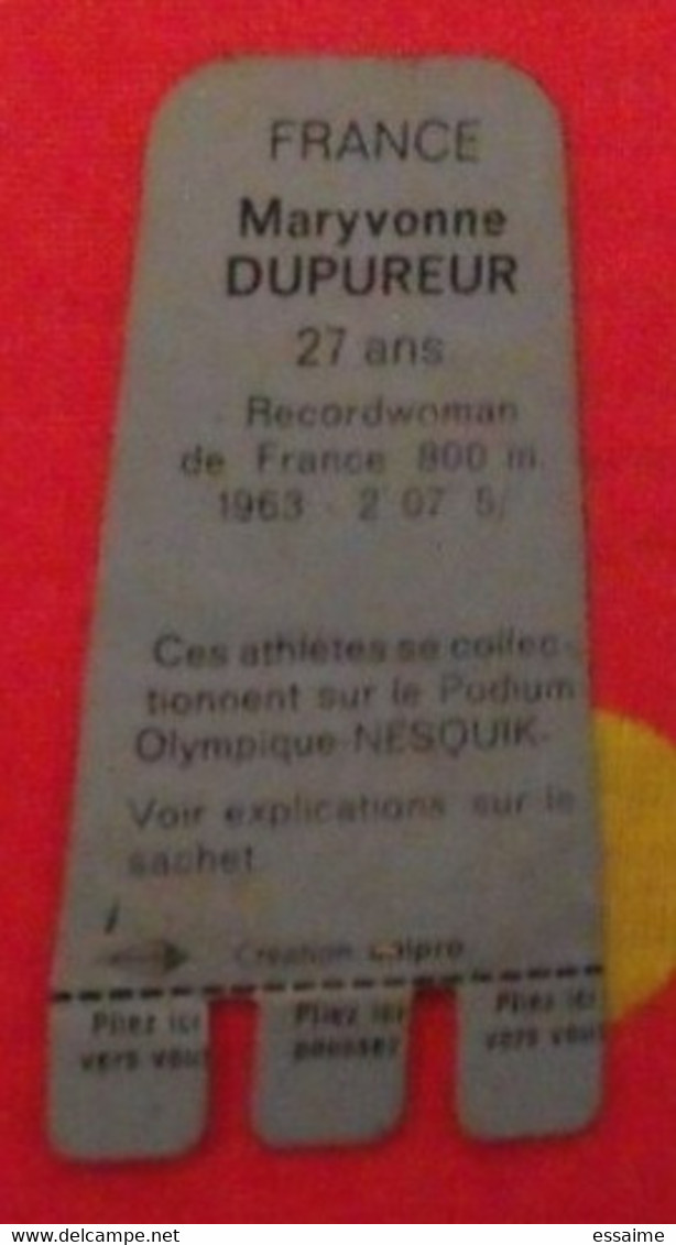 Plaquette Nesquik Jeux Olympiques. Podium Olympique. Maryvonne Dupureur. 800 M. France.  Tokyo 1964 - Plaques En Tôle (après 1960)