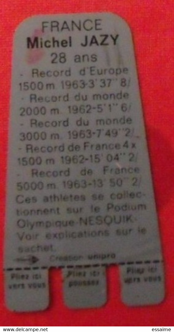 Plaquette Nesquik Jeux Olympiques. Podium Olympique. Michel Jazy. 5000 M. France.  Tokyo 1964 - Placas En Aluminio (desde 1961)