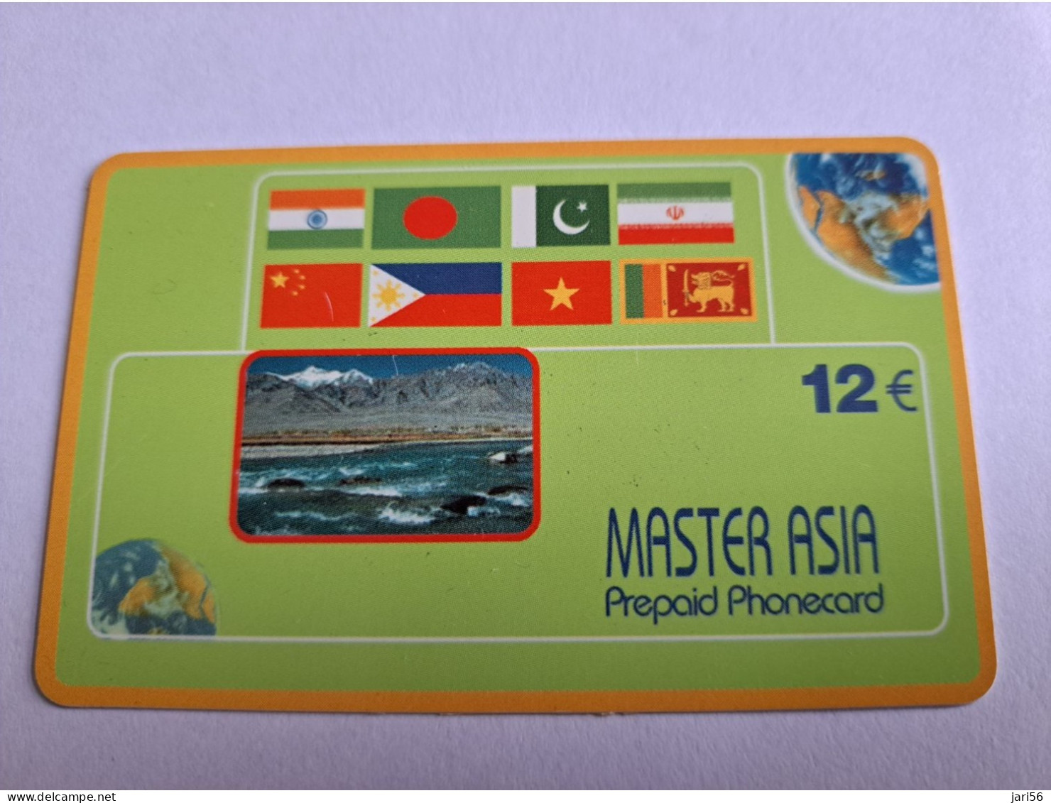 NETHERLANDS  PREPAID / € 12,- MASTER ASIA / FLAGS /MOUNTAIN/SEA/GLOBE     MINT CARD   ** 12937** - GSM-Kaarten, Bijvulling & Vooraf Betaalde