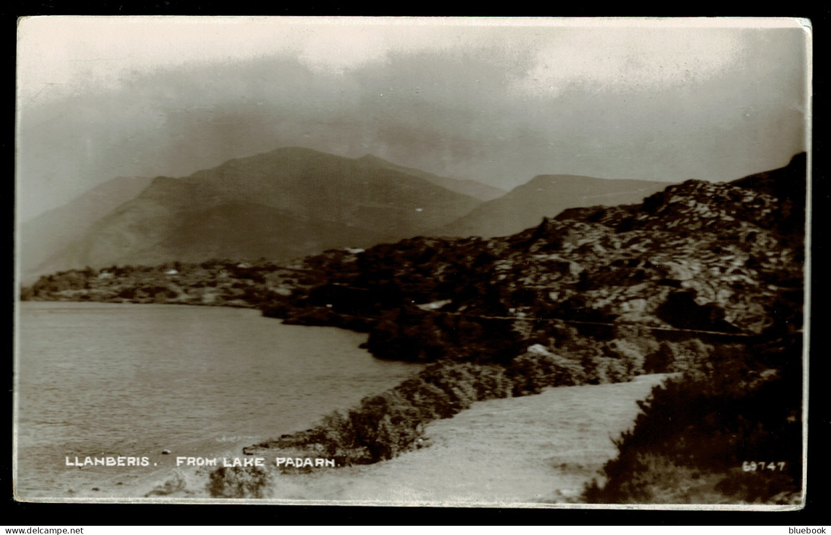 Ref  1604  -  Real Photo Postcard - Llanberis From Lake Padarn - Summit / Snowdon Cachet Wales - Caernarvonshire