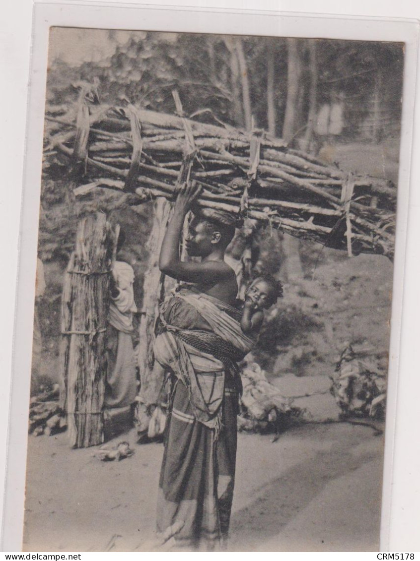 CPA-OUGANDA-WOMAN SELLING FIREWOOD-ENFANTS-BOIS - Ouganda