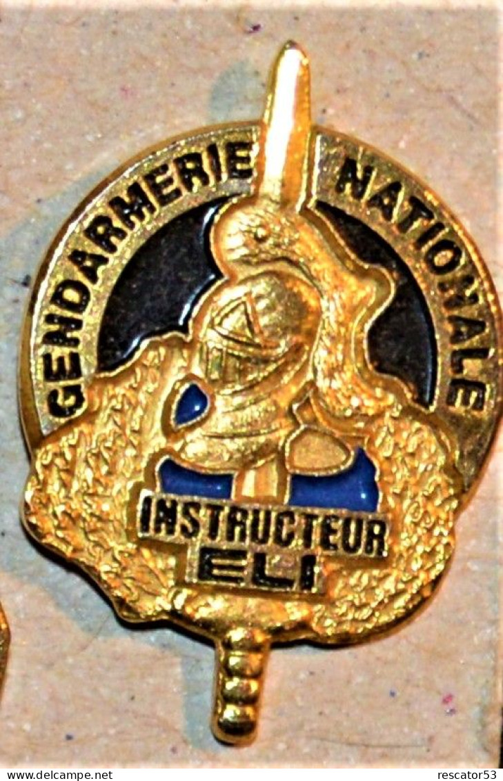 Pin's Gendarmerie Instructeur ELI - Police & Gendarmerie