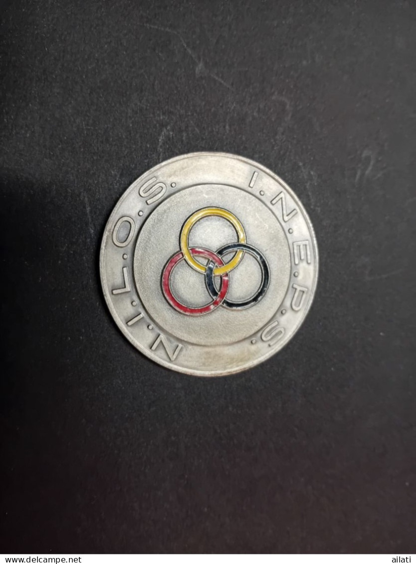 Une Médaille Sportive - Firma's