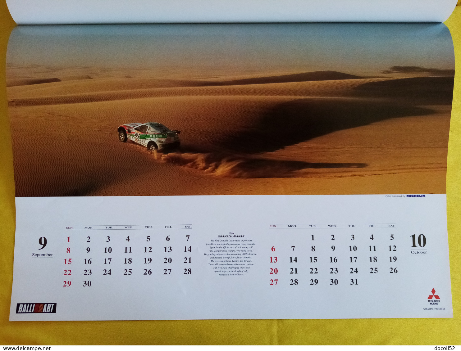 RARE ENSEIGNE MURALE DE CONCESSIONNAIRE MITSUBISHI MOTORS 62CMSX49CMS + 2 GRANDS CALENDRIERS MITSUBISHI RALLYE 1996/1997