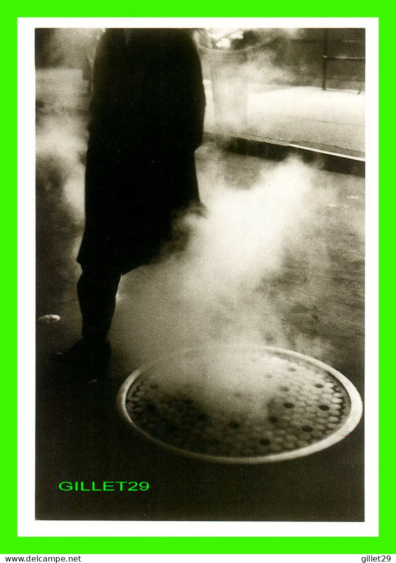 NEW YORK CITY, NY - MAN NEAR MANHOLE, TIMES SQUARE, 1954 - LOUIS STETTNER, 1922 - THE METROPOLITAN MUSEUM OF ART - - Museums