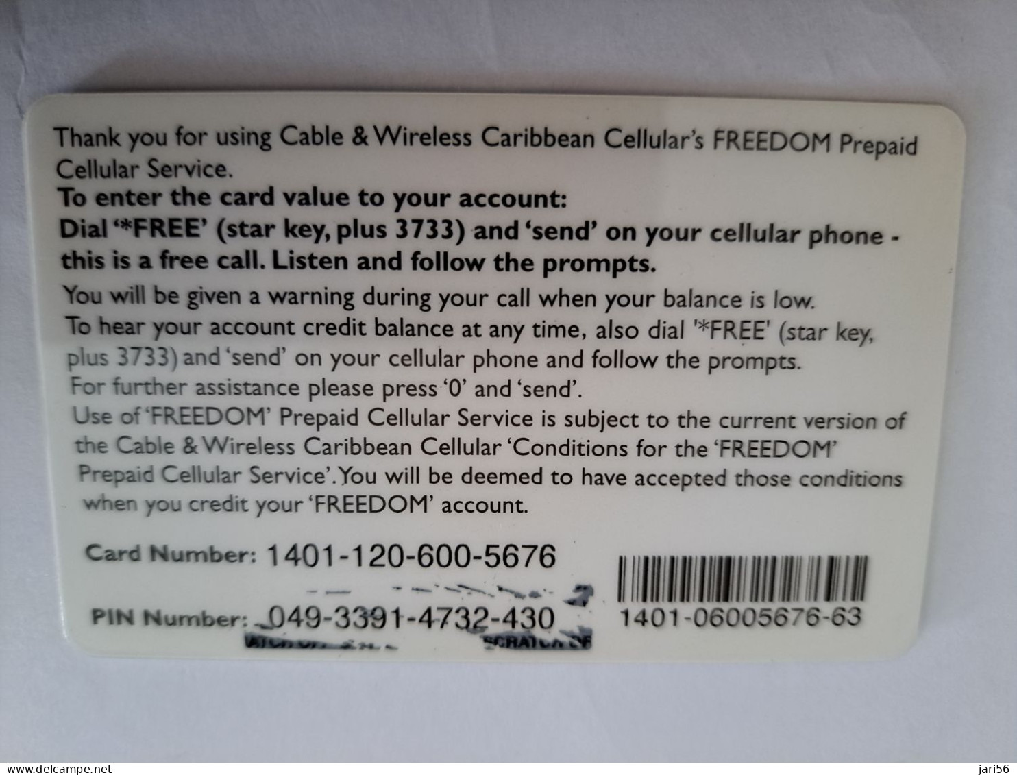 DOMINICA  $40,- PREPAID CELLULAIR /FREEDOM / WITH BARCODE ON BACK     ** 13263** - Dominica