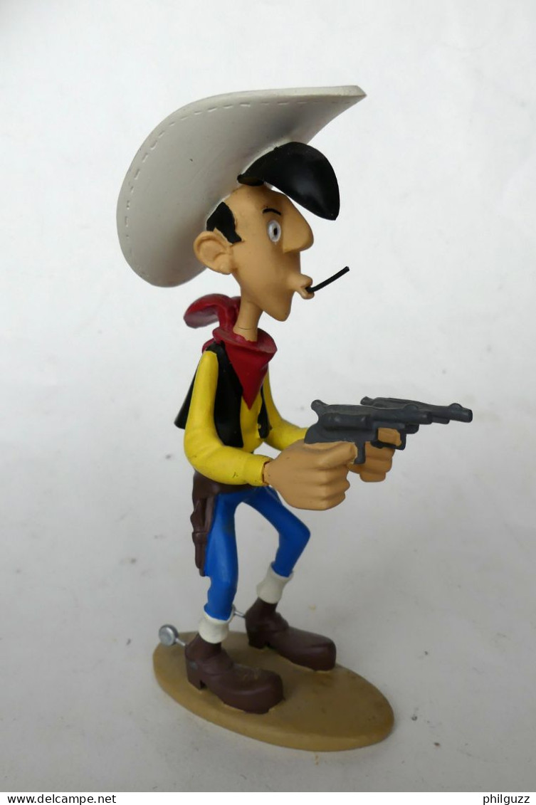 FIGURINE EN RESINE LUCKY LUKE ATLAS 01  (3) EN LOOSE Micro Fellure Au Cou - Autres & Non Classés