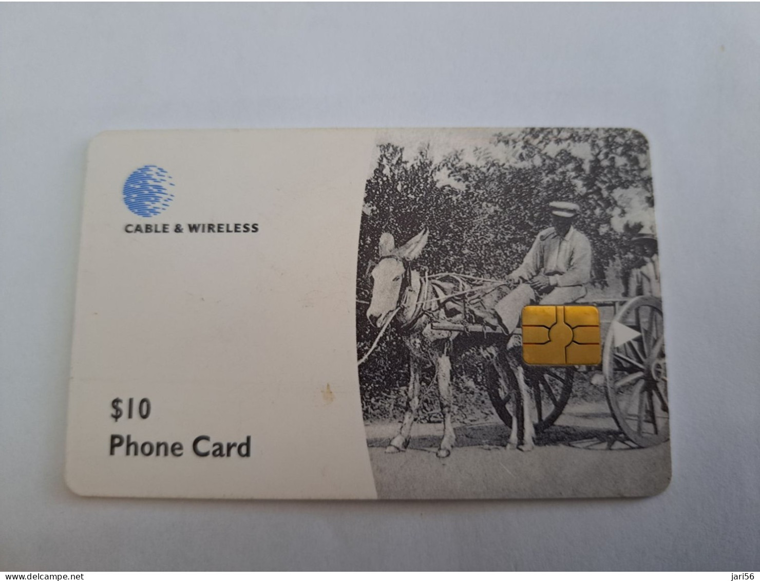 DOMINICA / $10,- CHIP  CARD / DOM - C1/ MAN RIDING DONKEY      Fine Used Card  ** 13339 ** - Dominica