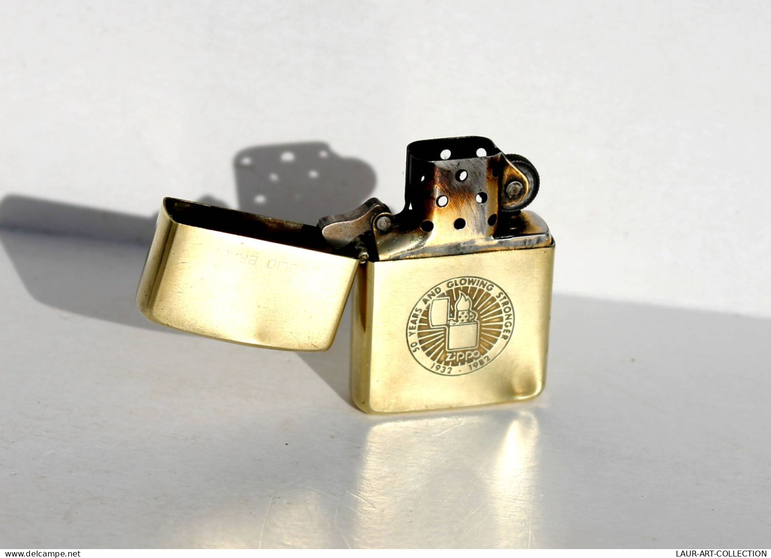 BRIQUET ZIPPO - 50 YEARS AND GLOWING STRONGER 1932-1982 BRADFORD - RECHARGEABLE / VINTAGE PETROL LIGHTER  (2304.77) - Zippo