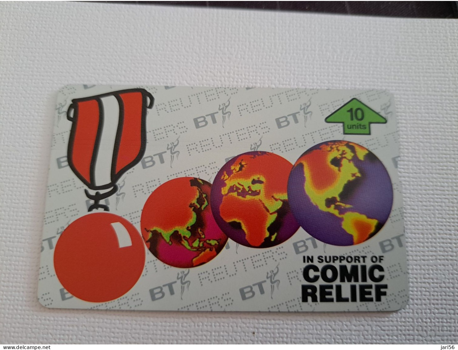 GREAT BRETAGNE 10 UNITS  EARTH ON CARD  / COMIC RELIEF   - Coin - BT**13377** - BT Übersee