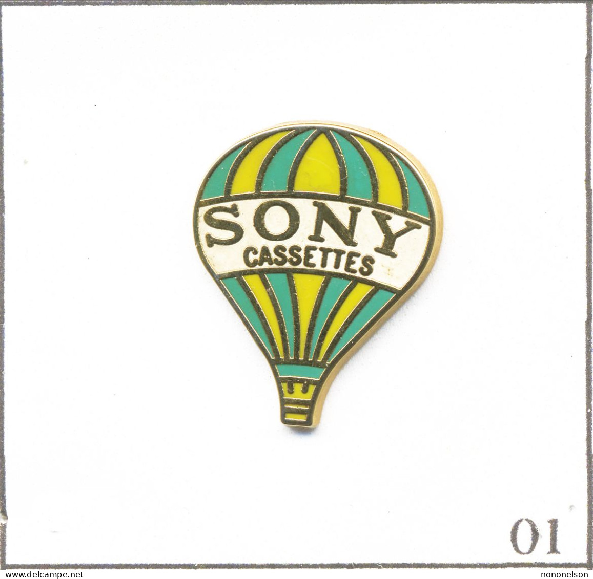 Pin's Transport - Montgolfière / Ballon Sony Cassettes 1989- Rayures Vertes Et Jaunes. Est. Sony 1989. Zamac. T943-01 - Airships