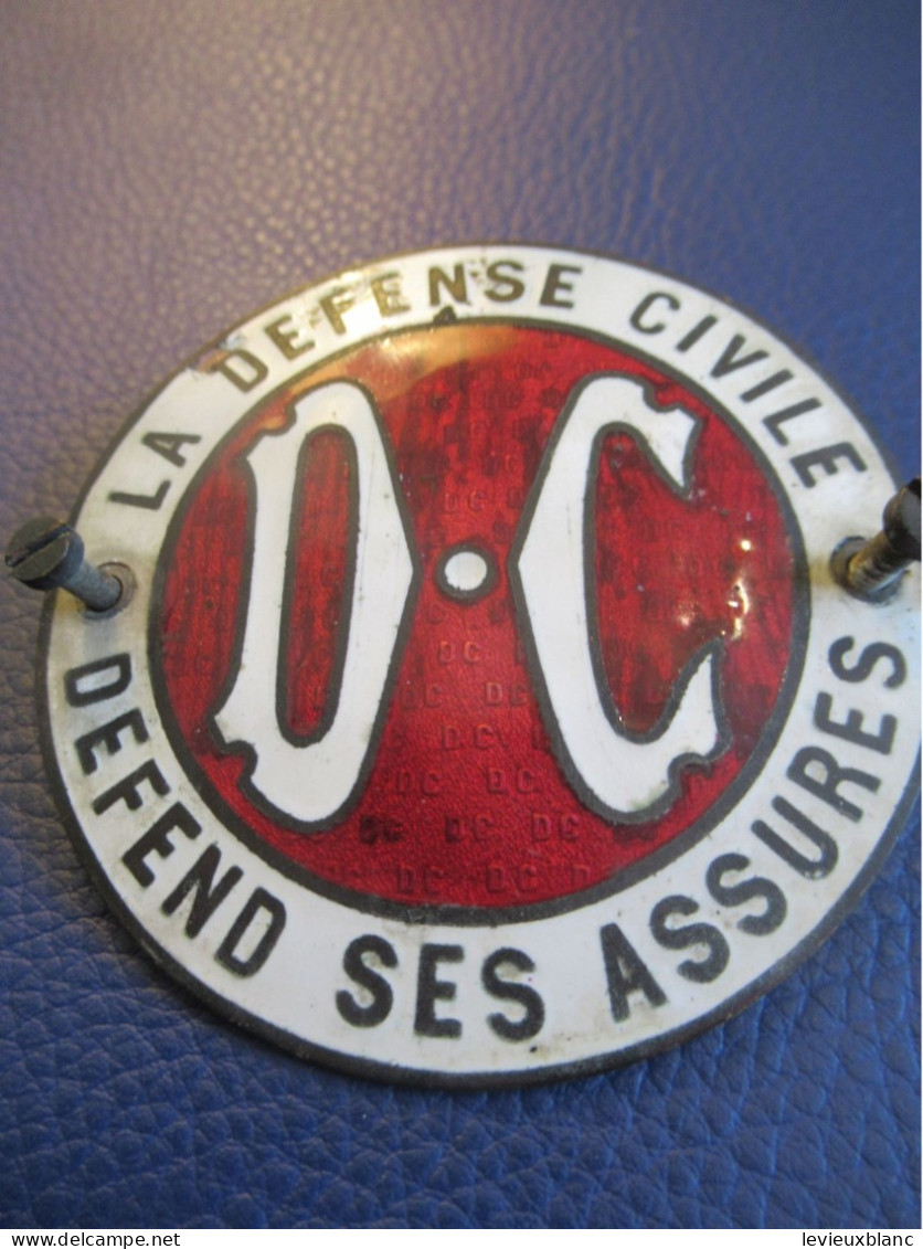 Plaque Ancienne De Calandre Automobile/ "D.C."/ "La Défense Civile Défend Ses Assurés"  /  Vers 1920 - 1950      AC189 - Autres & Non Classés