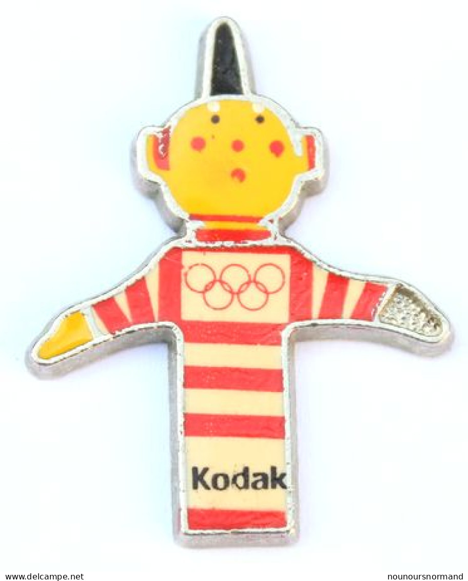 Rare Pin's KODAK - La Marionnette Du Voleur De Couleurs - Anneaux Olympiques - Albertville 92 ??? - M316 - Fotografie