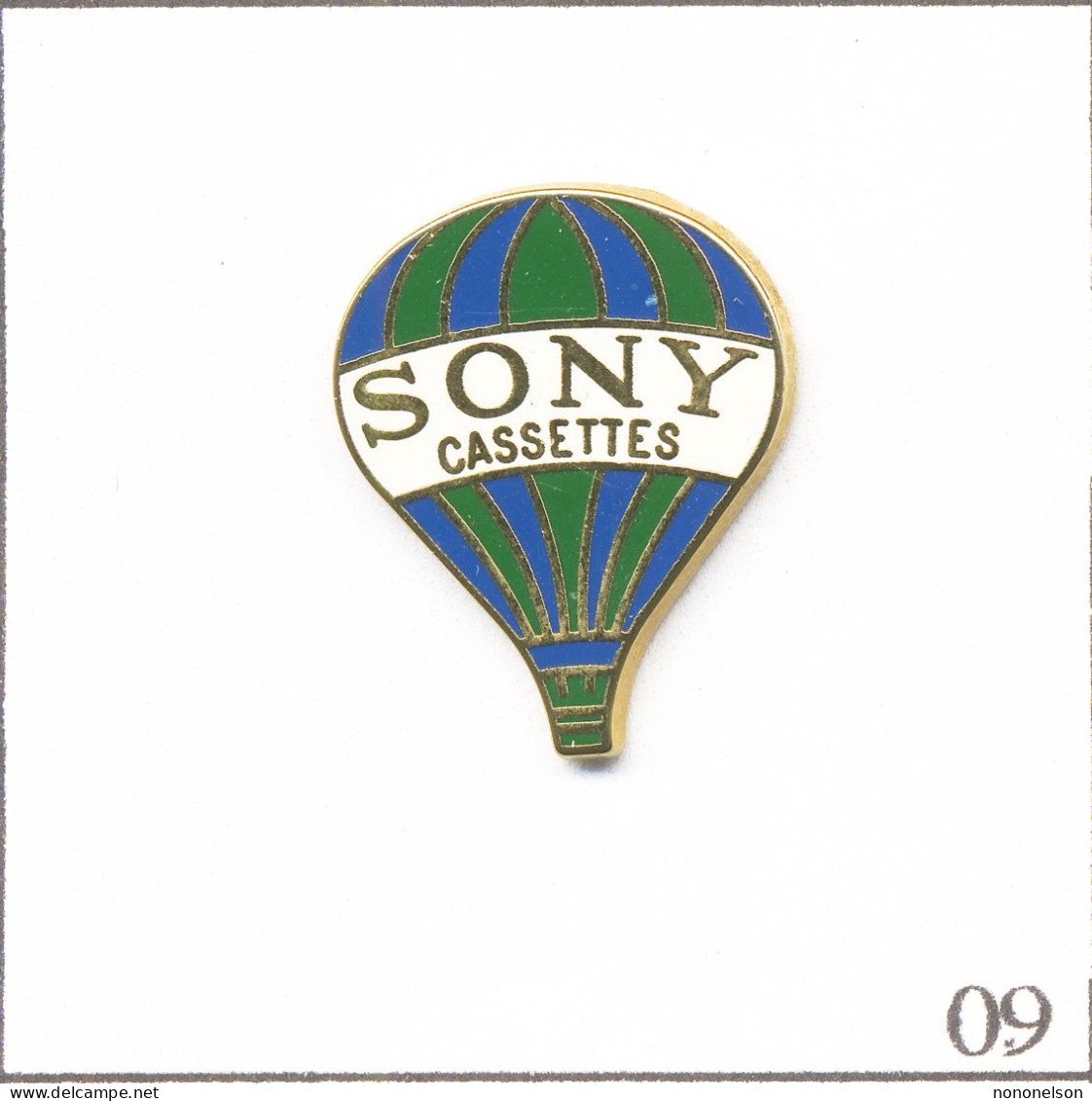 Pin's Transport - Montgolfière / Ballon “Sony“ - Rayures Vertes Et Bleues. Est. Sony 1989. Zamac. T953-09 - Airships