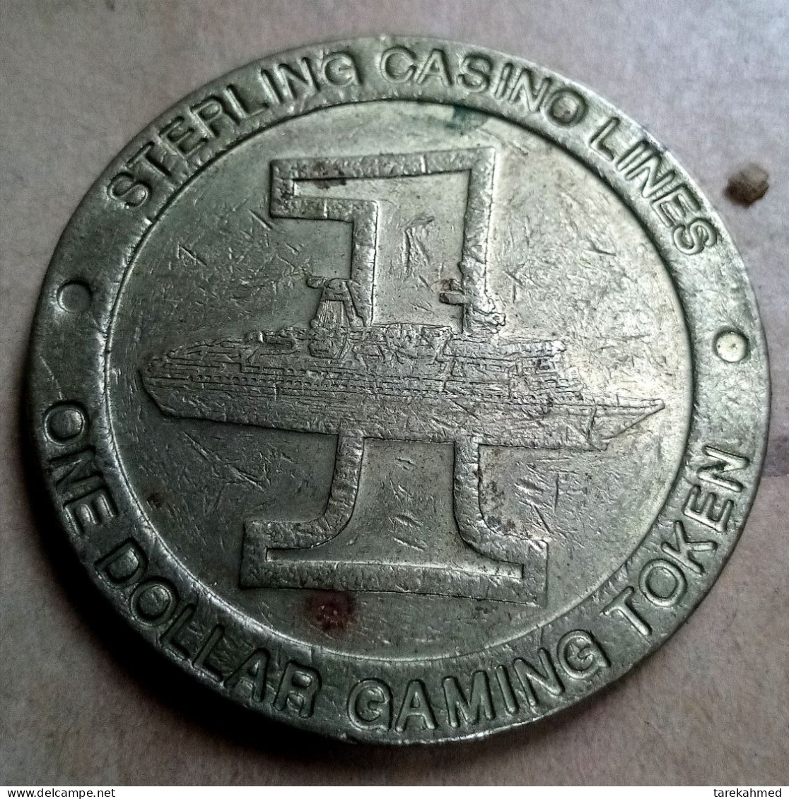 STERLING CASINO LINES ONE DOLLAR GAMING TOKEN VINTAGE ، Tokbag - Casino