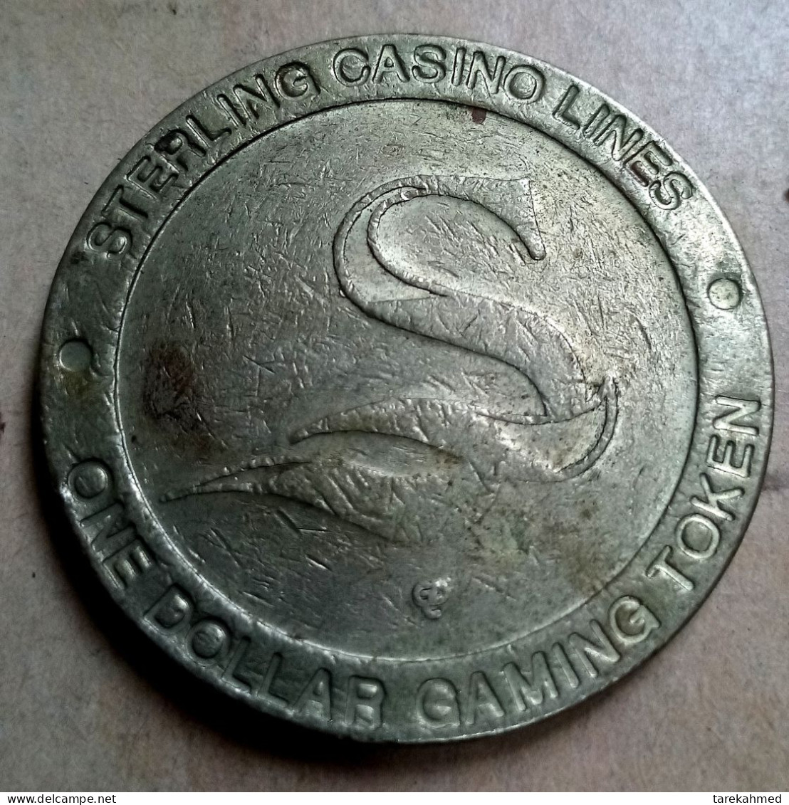 STERLING CASINO LINES ONE DOLLAR GAMING TOKEN VINTAGE ، Tokbag - Casino