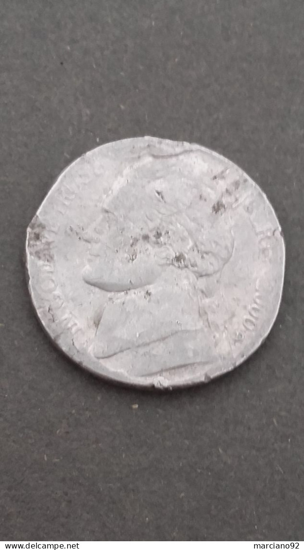 très rare pièce de monnais USA  Five Cent fautè !