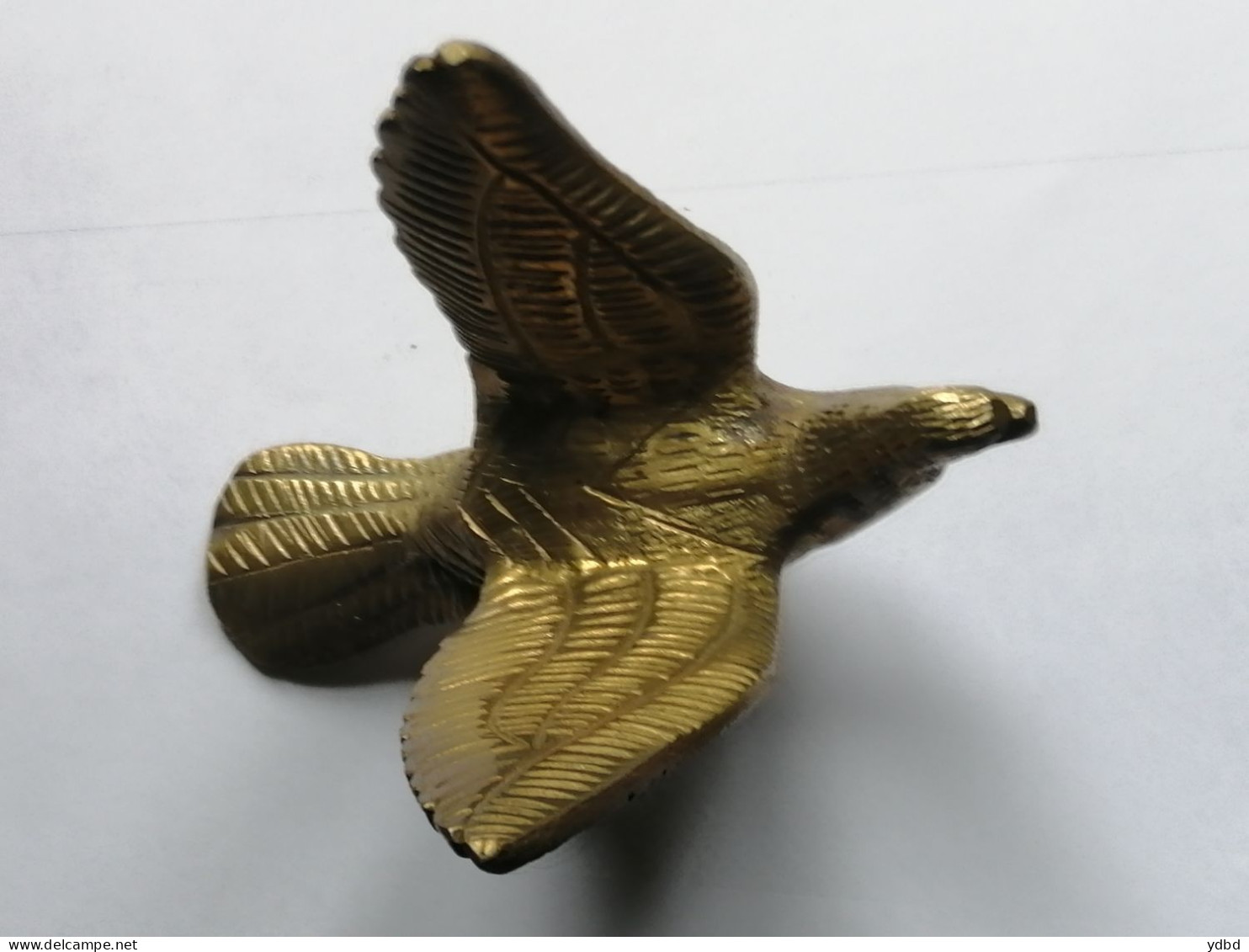 UN AIGLE EN BRONZE DORE - Bronces