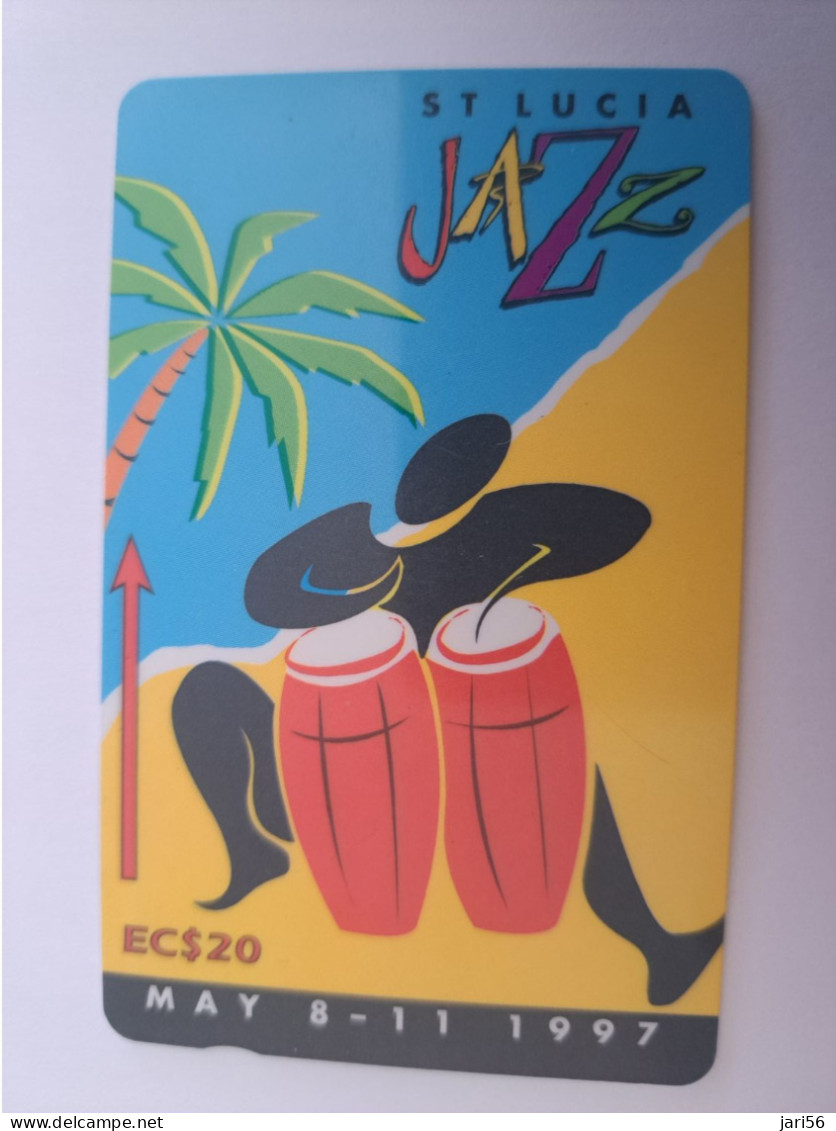 ST LUCIA    $ 20   CABLE & WIRELESS  STL-147E   147CSLE  JAZZ FESTIVAL 1997       Fine Used Card ** 14355 ** - Sainte Lucie