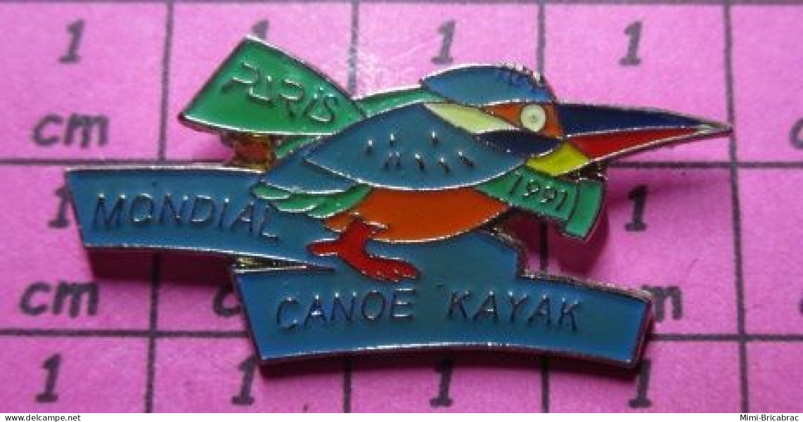 3217 Pin's Pins / Beau Et Rare / SPORTS / MONDIAL DE CANOE KAYAK 1991 OISEAU MULTICOLORE - Canoeing, Kayak