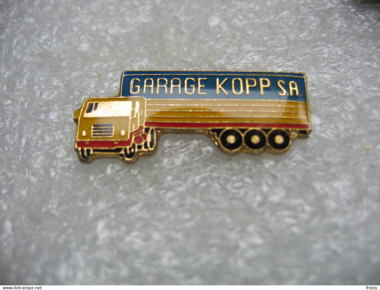 Pin's Du Garage Poids Lourd KOPP SA - Transports