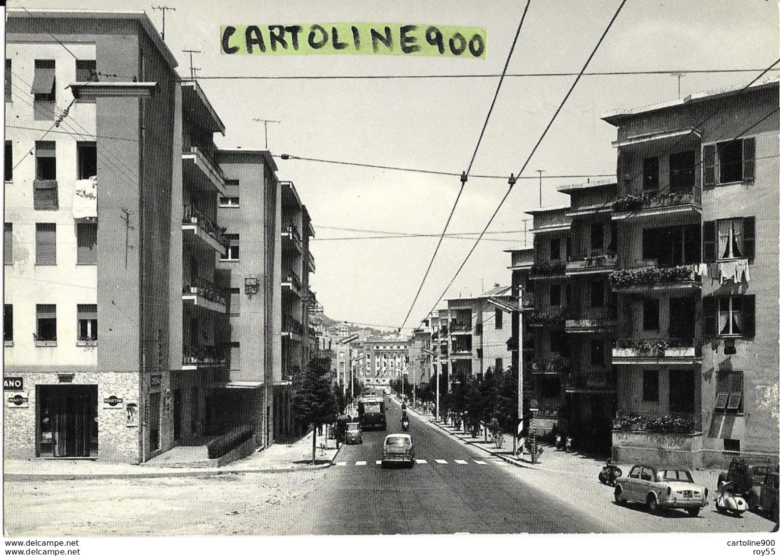 Sardegna-cagliari Via Pessina Veduta Panoramica Via Animata Negozi Vespa Fiat 1100 Filobus Furgone Ape - Cagliari