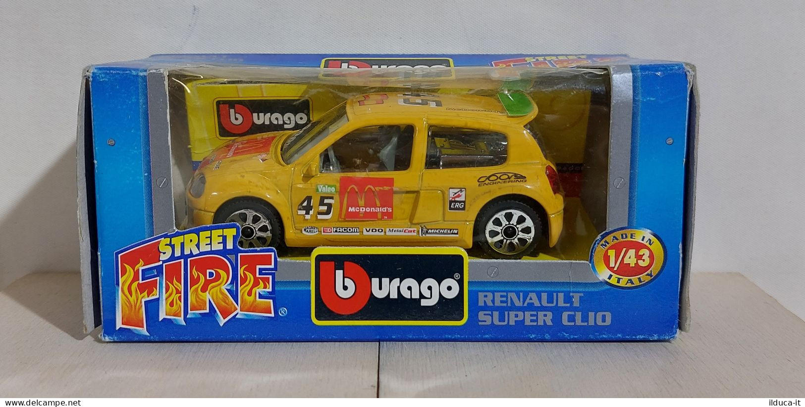 I116196 BURAGO 1/43 Serie Street Fire - Renault Super Clio - Box - Burago