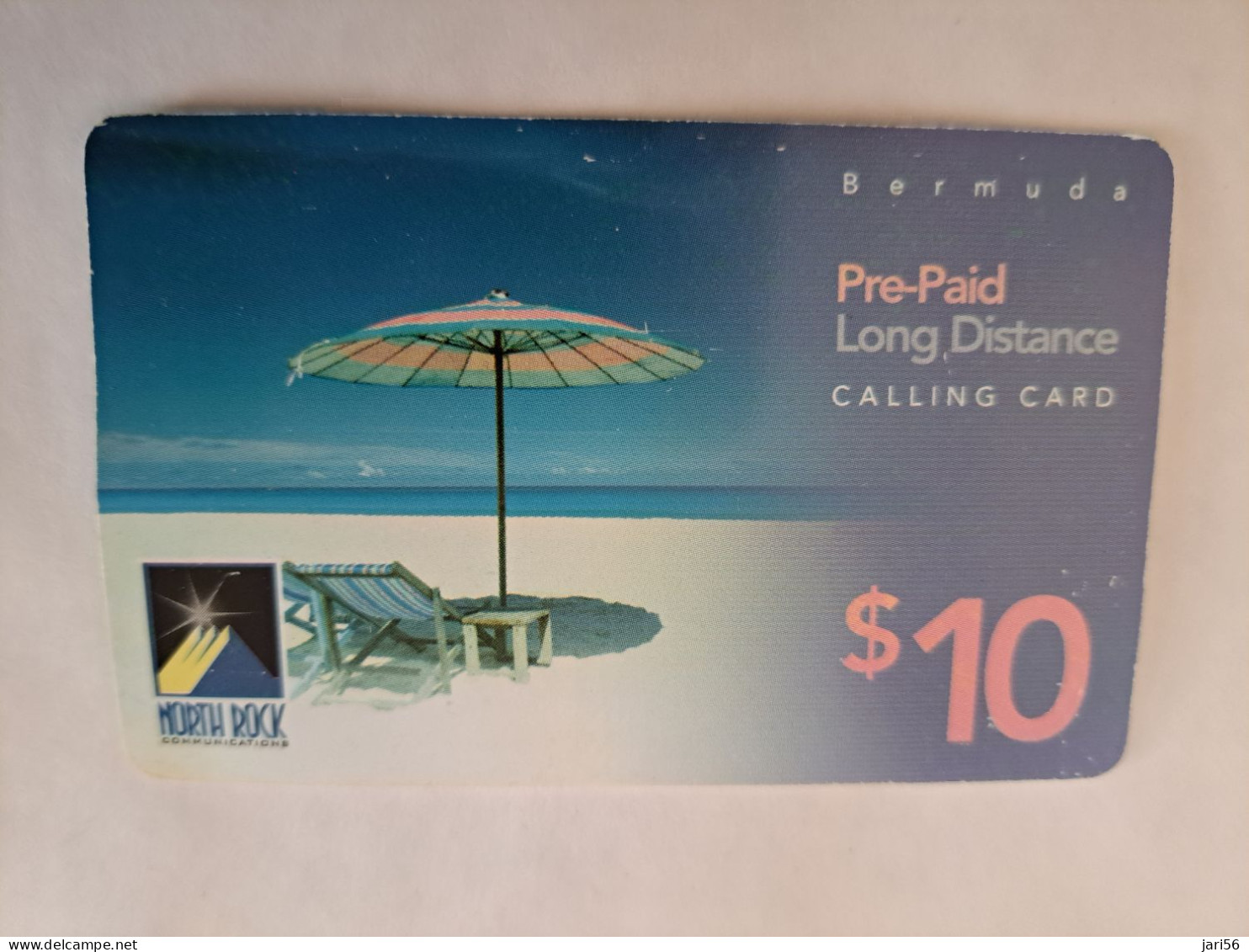 BERMUDA  $10,-,-NORTH ROCK   BERMUDA / PARASOL ON BEACH /  3/2005/   PREPAID CARD  Fine USED  **14794** - Bermudas