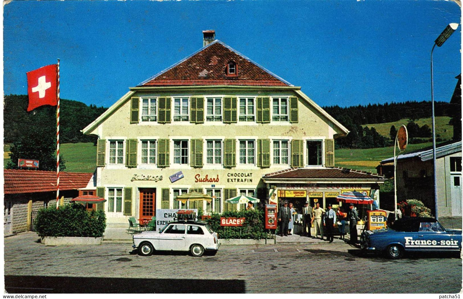 LES VERRIÈRES - Frontière Franco-Suisse - Bazar/Alimentation/Bar - Pub Suchard, France-soir- Pompe Shell - R/V - Les Verrières