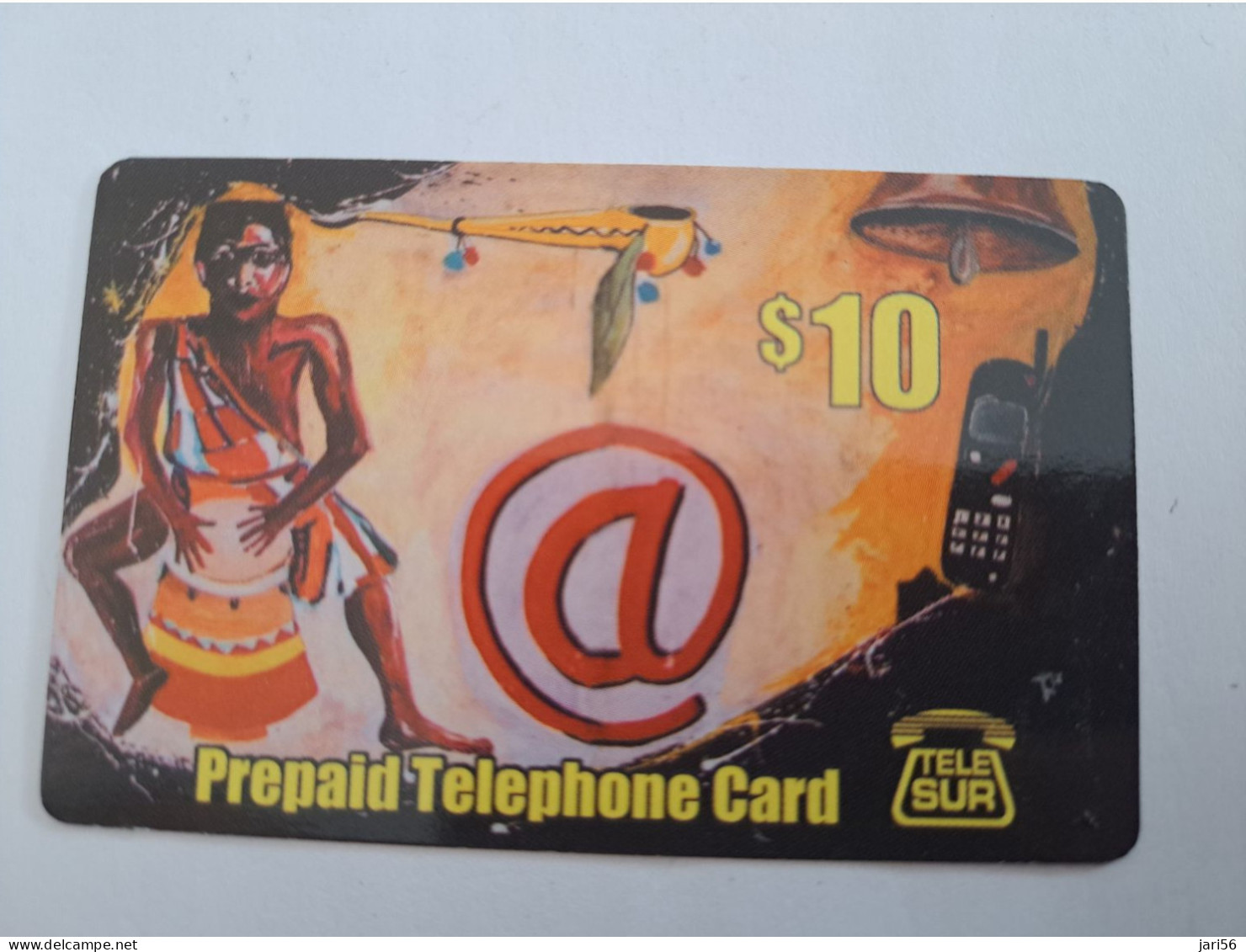 SURINAME US $ 10,-     PREPAID / TELESUR  / MAN ON DRUM  / FINE USED CARD            **14904** - Surinam