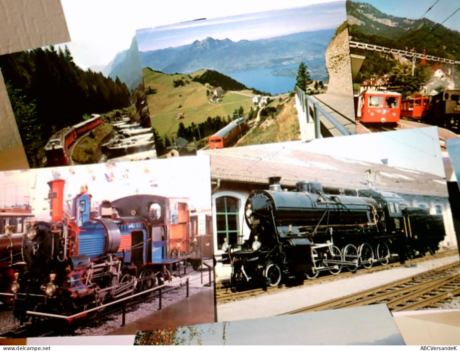 Eisenbahnen / Lokomotiven / Züge Ect. Schweiz. Konvolut. 9 X Ansichtskarten Farbig, Ungel. 1 X Beschrieben, Ca - Zug