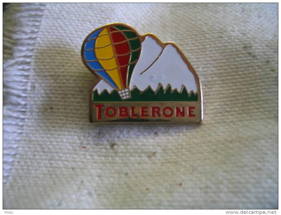 Pin's Montgolfiere  Chocolat TOBLERONE - Montgolfières