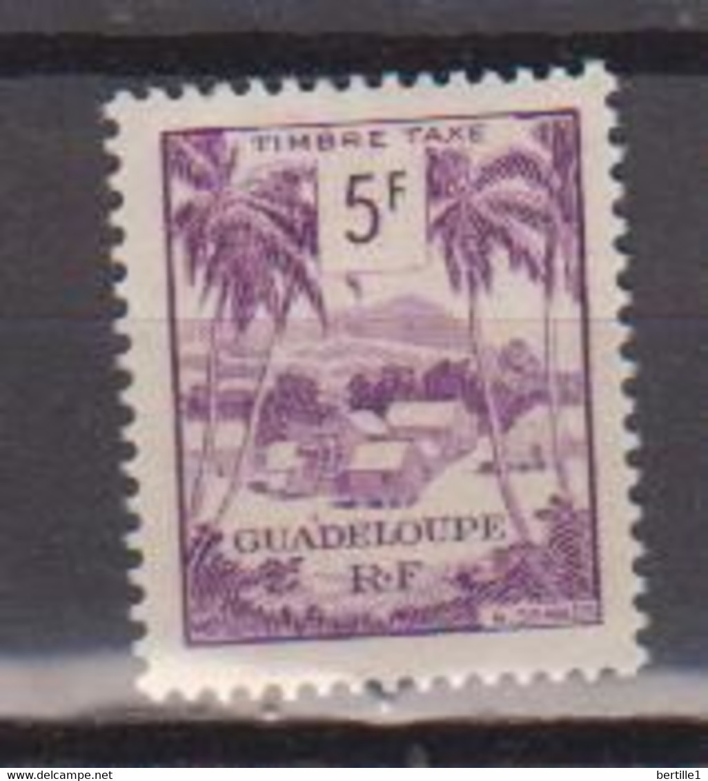 GUADELOUPE         N°  YVERT   TAXE  48  NEUF AVEC CHARNIERES      ( CHARN  01 / 28  ) - Strafport