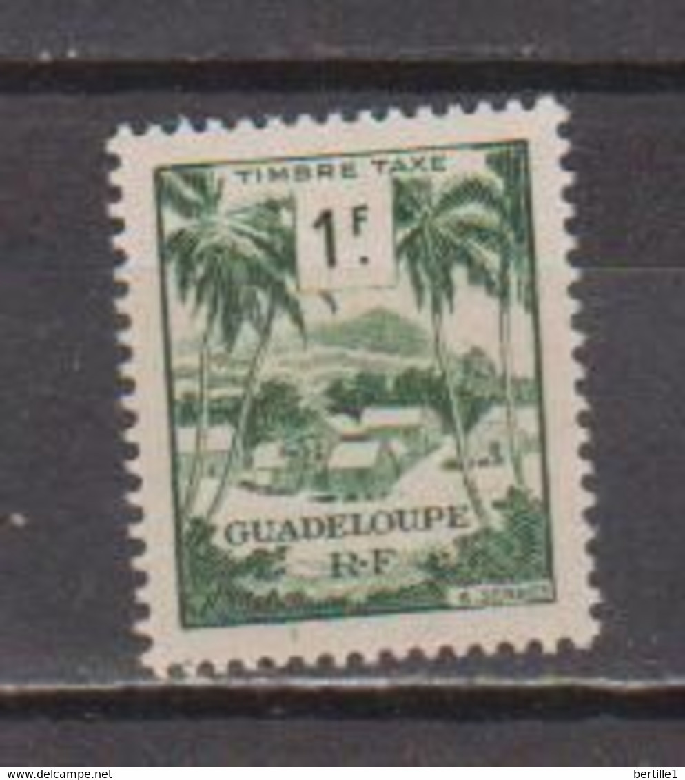 GUADELOUPE         N°  YVERT   TAXE  44  NEUF AVEC CHARNIERES      ( CHARN  01 / 28  ) - Strafport