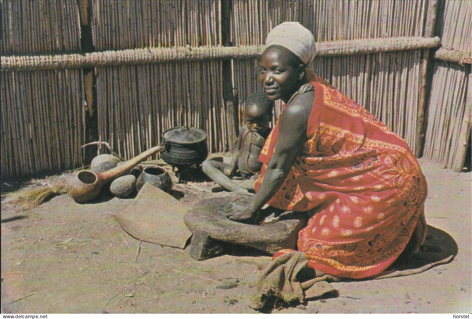 Swasiland - Housewife Grinding Mealies - Swasiland