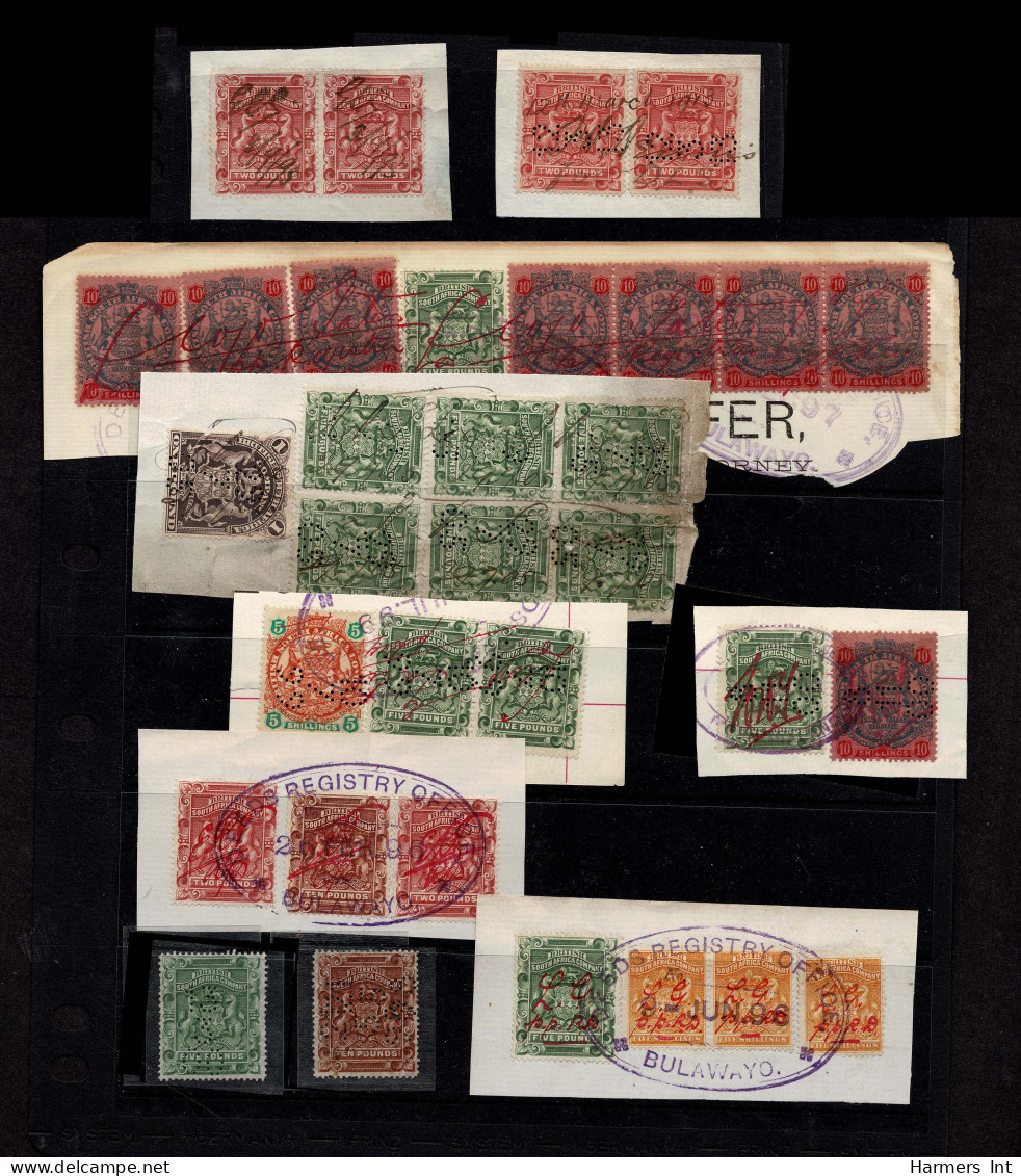 Lot # 800 Rhodesia: 1892-93 Arms On Pieces, Comprising £1 Deep Blue, 24 Stamps - Rhodesien & Nyasaland (1954-1963)