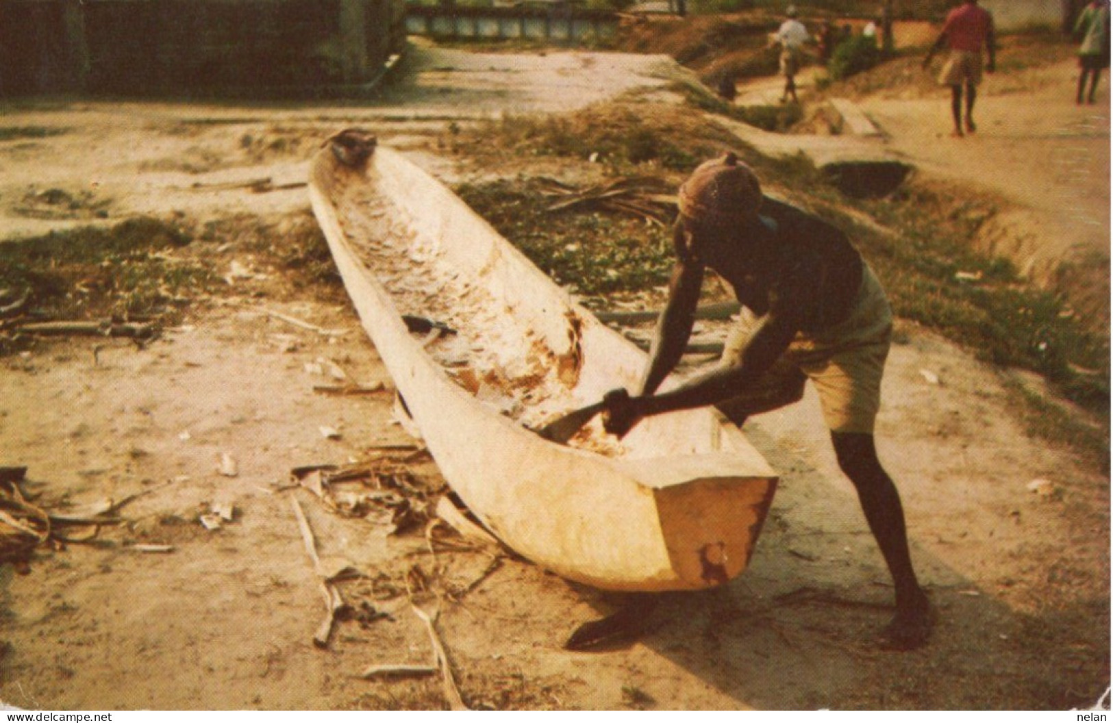 MAKING A DUG OUT CANOE - Liberia