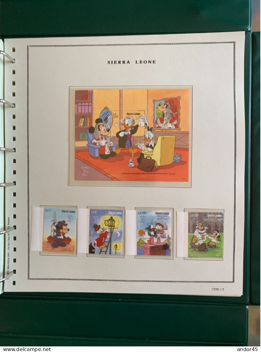 1990 ANNATA COMPLETA COLLEZIONE WALT DISNEY DA TUTTE LE PARTI DEL MONDO  MONTATA SU ALBUM CONTENENTE   FRANCOBOLLI SINGO