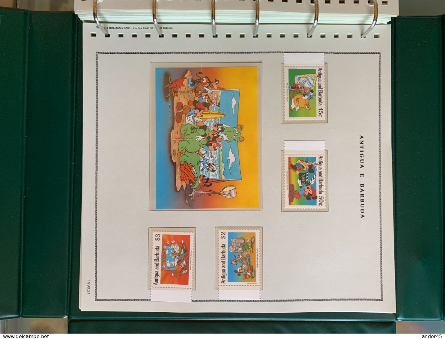 1990 ANNATA COMPLETA COLLEZIONE WALT DISNEY DA TUTTE LE PARTI DEL MONDO  MONTATA SU ALBUM CONTENENTE   FRANCOBOLLI SINGO