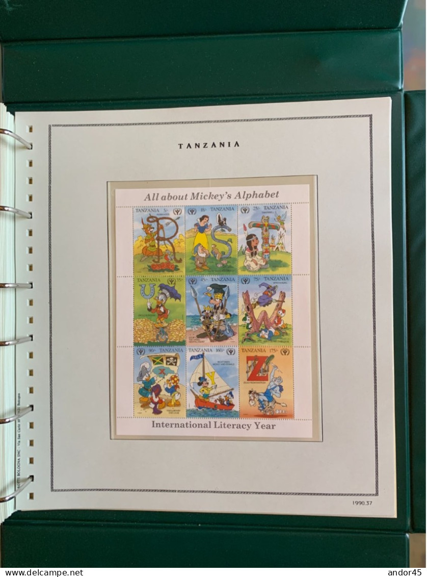 1990 ANNATA COMPLETA COLLEZIONE WALT DISNEY DA TUTTE LE PARTI DEL MONDO  MONTATA SU ALBUM CONTENENTE   FRANCOBOLLI SINGO