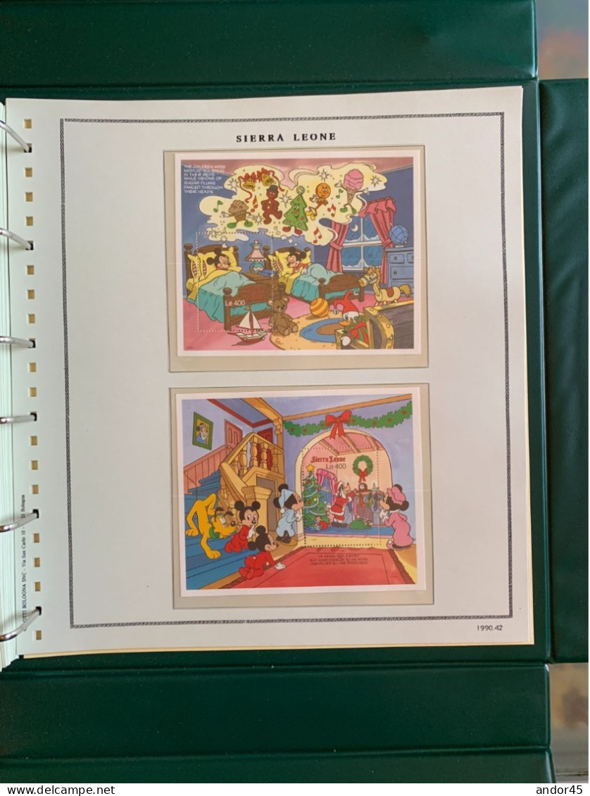 1990 ANNATA COMPLETA COLLEZIONE WALT DISNEY DA TUTTE LE PARTI DEL MONDO  MONTATA SU ALBUM CONTENENTE   FRANCOBOLLI SINGO