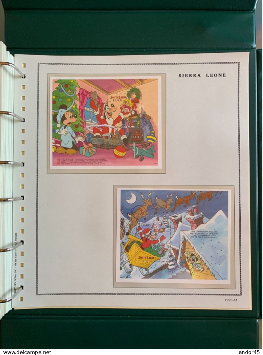 1990 ANNATA COMPLETA COLLEZIONE WALT DISNEY DA TUTTE LE PARTI DEL MONDO  MONTATA SU ALBUM CONTENENTE   FRANCOBOLLI SINGO