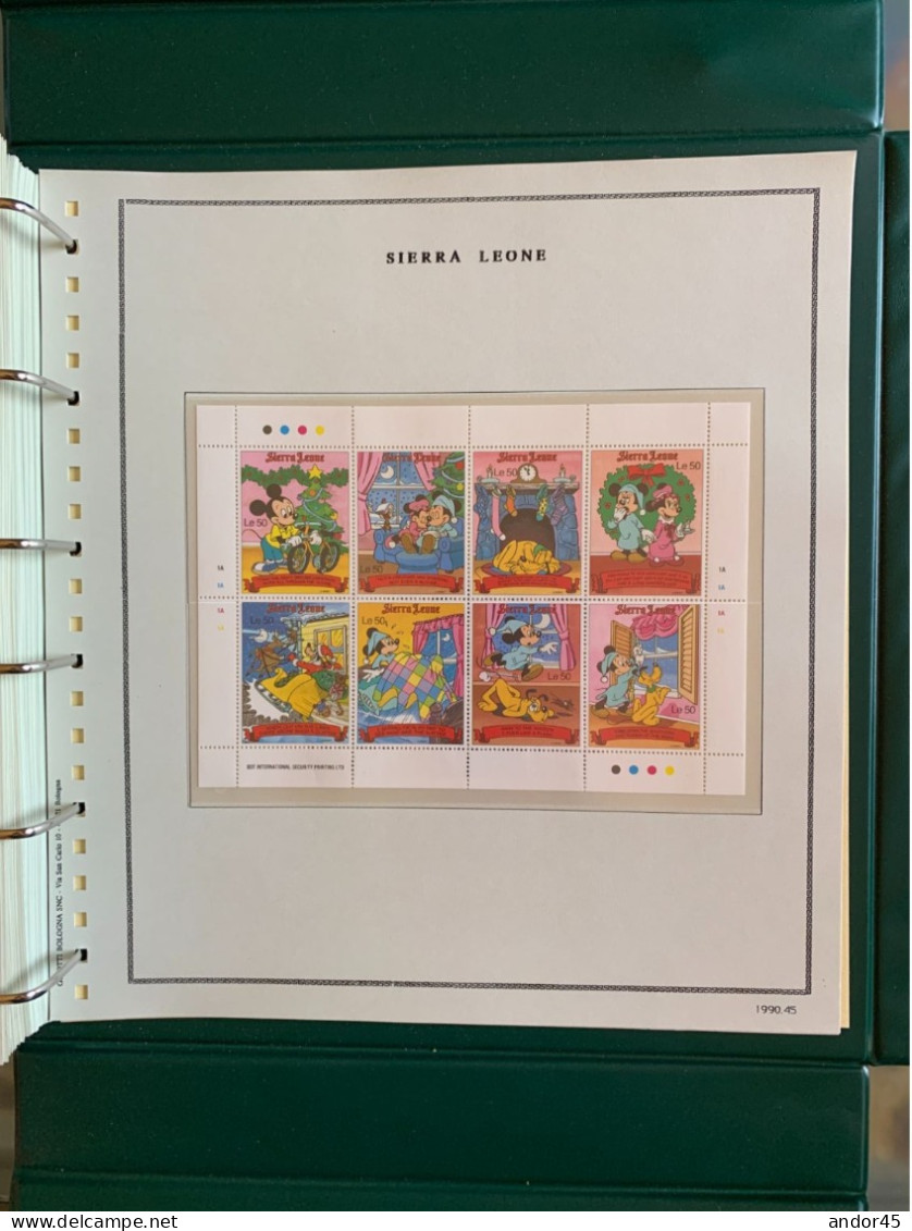 1990 ANNATA COMPLETA COLLEZIONE WALT DISNEY DA TUTTE LE PARTI DEL MONDO  MONTATA SU ALBUM CONTENENTE   FRANCOBOLLI SINGO