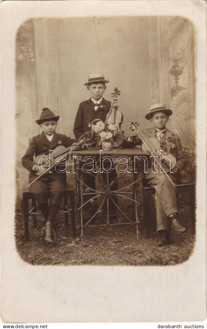 ** T2/T3 Boys' Violin Trio. Photo (EK) - Unclassified