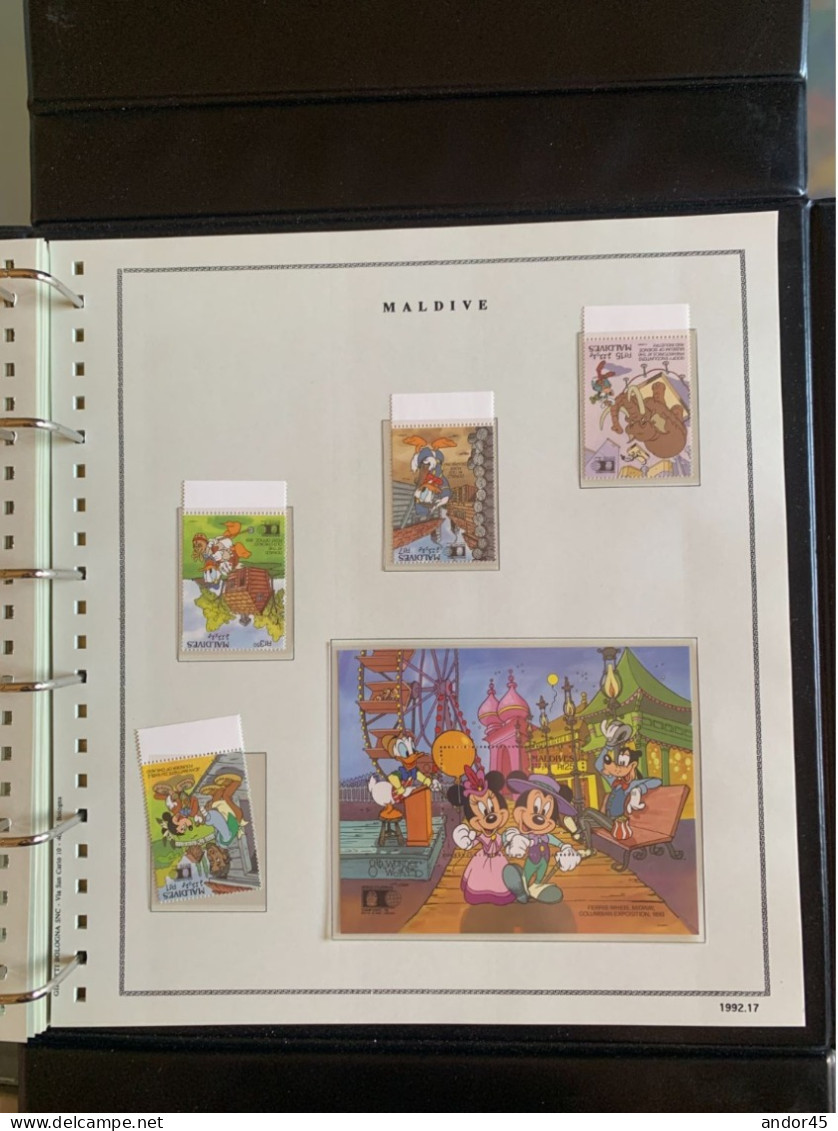 1992 ANNATA COMPLETA COLLEZIONE WALT DISNEY DA TUTTE LE PARTI DEL MONDO  MONTATA SU ALBUM CONTENENTE   FRANCOBOLLI SINGO