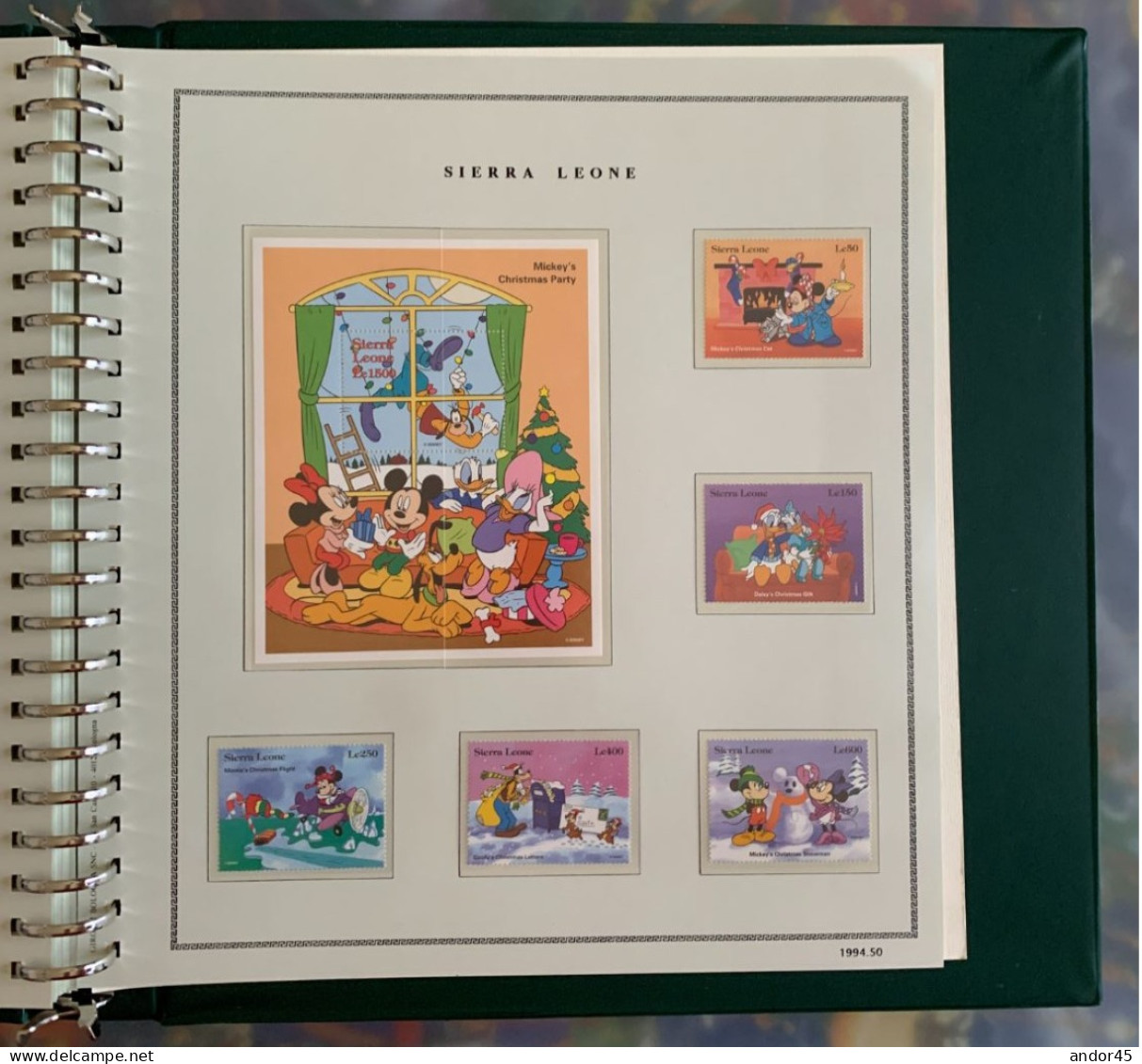 1994 ANNATA COMPLETA COLLEZIONE WALT DISNEY DA TUTTE LE PARTI DEL MONDO  MONTATA SU ALBUM CONTENENTE   FRANCOBOLLI SINGO