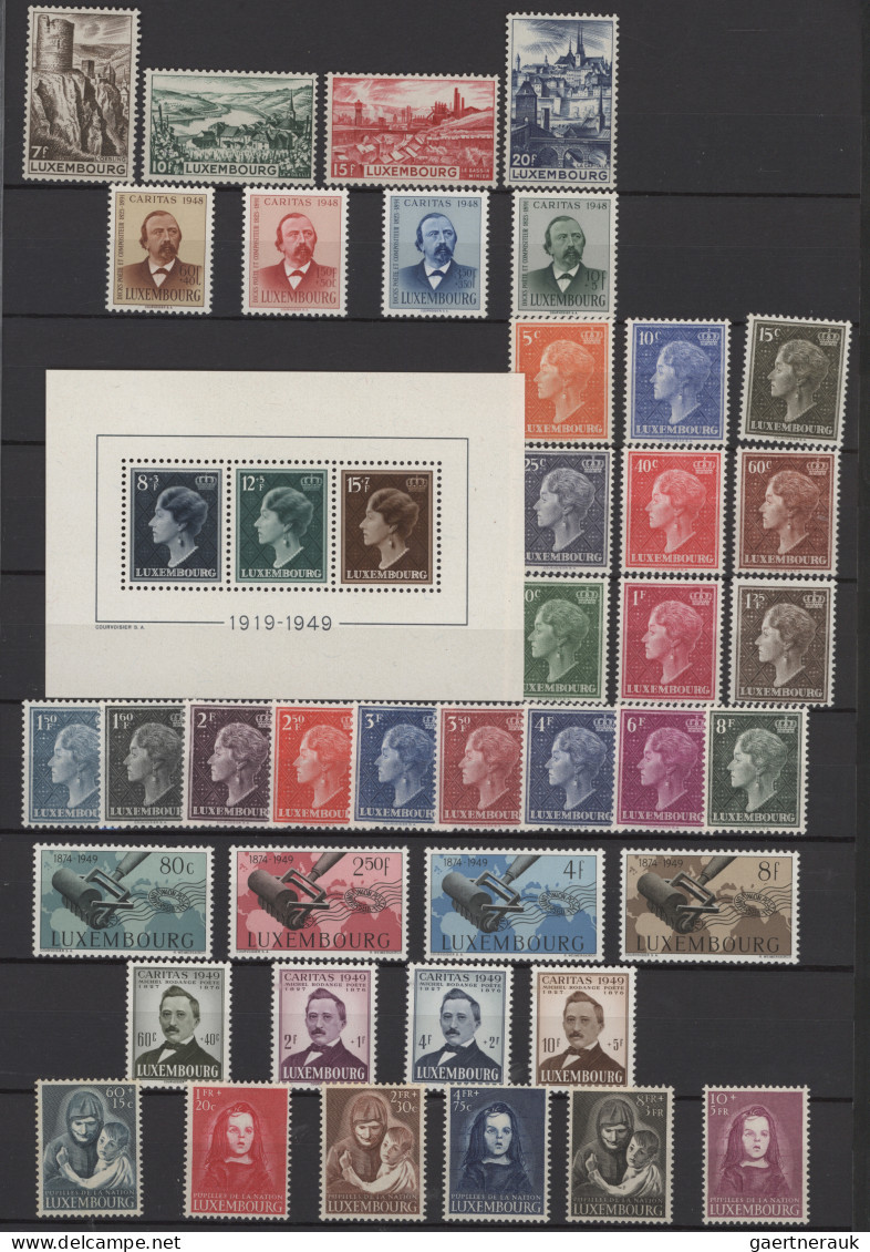 Luxembourg: 1945/1990, Apparently Complete MNH Collection In A Stockbook, Two Se - Briefe U. Dokumente